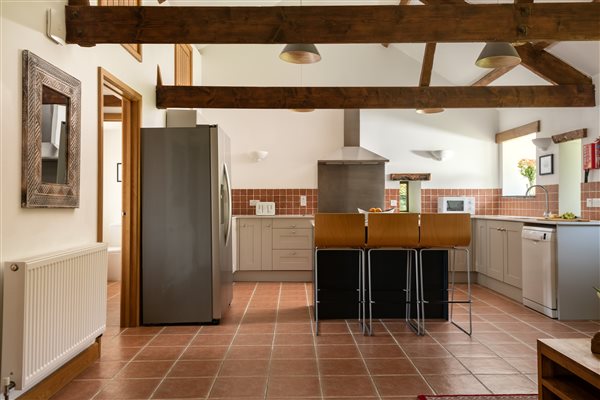 Corn Barn kitchen with stools at the island